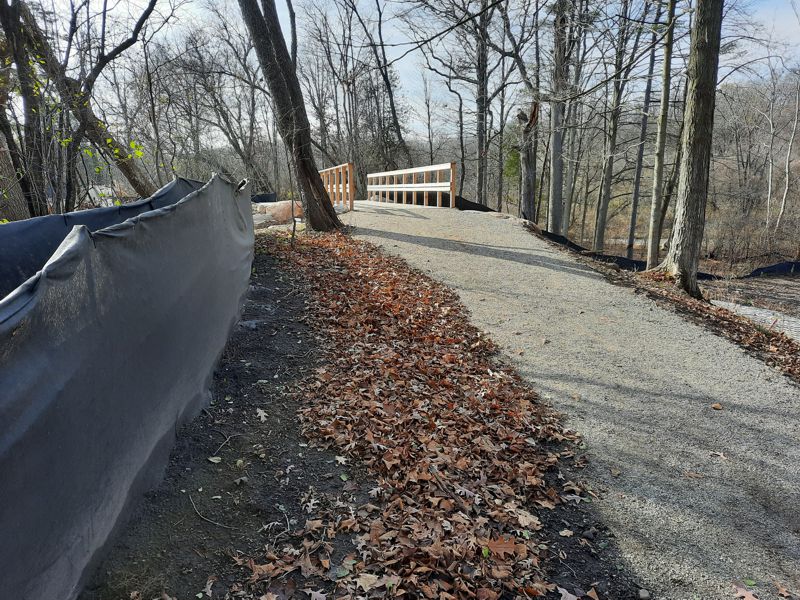 Trail up to 2023 bridge at stormwater spillway Trail up to 2023 bridge at stormwater spillway